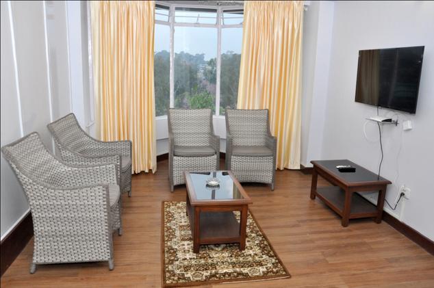 hotel-orchid-annex-shillong-room-sitting-area-60474146689g